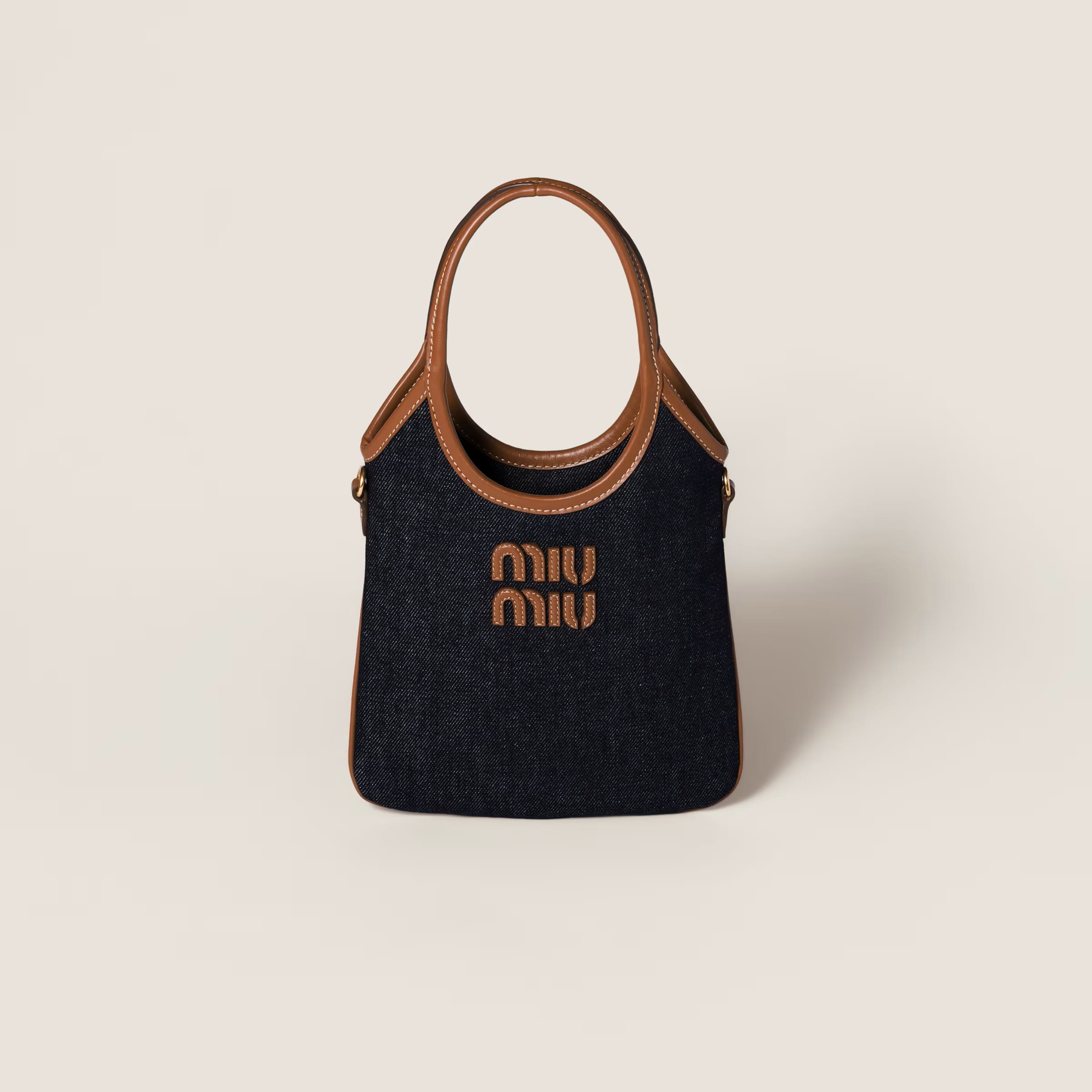 IVY denim handbag, SGD 2270 (approximately P100,125.25), MIU MIU, miumiu.com